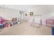 Open bonus room featuring neutral carpet, recessed lighting, and versatile space for play or relaxation at 1709 Chestnut Falls Rd, Wendell, NC 27591