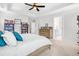 Open main bedroom featuring tray ceilings, and access to ensuite bathroom at 1709 Chestnut Falls Rd, Wendell, NC 27591