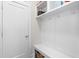 Well-organized mud room with built-in storage, bench, and easy access to the house at 1709 Chestnut Falls Rd, Wendell, NC 27591