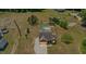 Expansive lot with pool, outbuilding, and charming home with mature trees and lawn at 187 Old Johnson Rd, Wendell, NC 27591