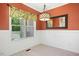 Bright dining area featuring large windows with floral valances, and an elegant chandelier at 187 Old Johnson Rd, Wendell, NC 27591