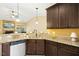 Beautiful kitchen with granite countertops, stainless steel dishwasher and ample counter space for cooking at 187 Old Johnson Rd, Wendell, NC 27591