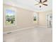 Spacious main bedroom boasts a tray ceiling, recessed lighting, and two windows for natural light at 187 Old Johnson Rd, Wendell, NC 27591