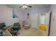 Whimsical ' room with character wall decals, a play kitchen, and a tidy study area at 19 Rivers Edge Ct, Timberlake, NC 27583
