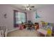 Bedroom decorated with character decals, a window, and a colorful play area setup at 19 Rivers Edge Ct, Timberlake, NC 27583