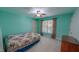 Bright bedroom with blue walls, large windows, and a comfortable sleeping arrangement at 19 Rivers Edge Ct, Timberlake, NC 27583