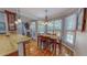 Dining Area and bar with view into Living Room with Fireplace at 19 Rivers Edge Ct, Timberlake, NC 27583