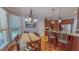 Dining area complemented by a view into the kitchen, creating an open and inviting space at 19 Rivers Edge Ct, Timberlake, NC 27583