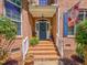 Charming brick home with a blue front door, white trim, and decorative landscaping at 19 Rivers Edge Ct, Timberlake, NC 27583