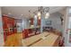 Kitchen with stainless steel appliances and view into living room and dining area at 19 Rivers Edge Ct, Timberlake, NC 27583