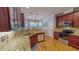 Kitchen with granite countertops, stainless steel appliances, and breakfast bar at 19 Rivers Edge Ct, Timberlake, NC 27583