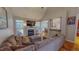 Spacious living room with fireplace and view to the kitchen and dining room at 19 Rivers Edge Ct, Timberlake, NC 27583