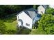 Aerial view of home with a spacious backyard and established landscaping at 1909 Redding Lane, Durham, NC 27712