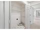 Walk-in closet with shelving and flooring and plenty of open space for storage and organization at 1909 Redding Lane, Durham, NC 27712