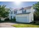 Charming two-story home boasts a two-car garage and well-maintained landscaping at 1909 Redding Lane, Durham, NC 27712