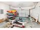 Spacious garage with ample storage for kayaks, trailer, and other recreational equipment at 1909 Redding Lane, Durham, NC 27712