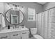 Modern bathroom with updated fixtures and a neutral color palette at 20 Keswick Ct, Durham, NC 27713