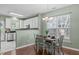 Comfortable dining space with views into the kitchen, providing a relaxed atmosphere for casual meals at 20 Keswick Ct, Durham, NC 27713