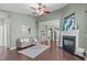 Spacious living room with vaulted ceilings, fireplace, and seamless flow to other living areas at 20 Keswick Ct, Durham, NC 27713