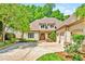 Traditional home with a three-car garage and a well-manicured lawn at 20011 Bragg, Chapel Hill, NC 27517