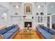 Spacious living room with hardwood floors, fireplace, and beautiful decor at 20011 Bragg, Chapel Hill, NC 27517