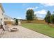 Expansive backyard featuring a lush lawn, firepit, patio and plenty of space for outdoor activities at 203 Green Pasture Rd, Mebane, NC 27302