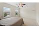 Bedroom with neutral carpet, two large windows and ceiling fan at 203 Green Pasture Rd, Mebane, NC 27302