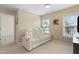Bonus room features reclining sofa, neutral paint and carpet and natural light at 203 Green Pasture Rd, Mebane, NC 27302