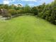 View of a disc golf course with well-maintained grass, surrounded by trees and walking paths at 203 Green Pasture Rd, Mebane, NC 27302