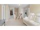 Upstairs hallway featuring a white recliner with carpeted floors and neutral walls at 203 Green Pasture Rd, Mebane, NC 27302