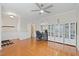 Open-concept space showing the office adjacent to the living room with hardwood floors at 203 Green Pasture Rd, Mebane, NC 27302