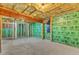Unfinished basement space with insulation, framing, and concrete flooring at 2049 Rainy Lake St, Wake Forest, NC 27587