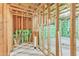 Unfinished basement featuring exposed framing and concrete flooring at 2049 Rainy Lake St, Wake Forest, NC 27587
