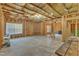 Unfinished basement with framed walls, insulation, and window at 2049 Rainy Lake St, Wake Forest, NC 27587