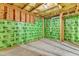Unfinished basement featuring exposed framing, concrete flooring and insulation at 2049 Rainy Lake St, Wake Forest, NC 27587