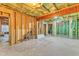Unfinished basement featuring exposed framing and concrete flooring at 2049 Rainy Lake St, Wake Forest, NC 27587