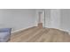 Well-lit bedroom features wood floors, neutral walls, and closet at 2049 Rainy Lake St, Wake Forest, NC 27587