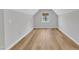 Bedroom featuring wood-look floors and a large window with natural light at 2049 Rainy Lake St, Wake Forest, NC 27587