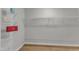 Walk-in closet featuring built-in shelving for optimal organization and storage at 2049 Rainy Lake St, Wake Forest, NC 27587