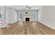 Spacious living room featuring hardwood floors, fireplace, and natural light at 2049 Rainy Lake St, Wake Forest, NC 27587
