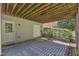 Covered patio with stone pavers, providing shade and outdoor access at 2049 Rainy Lake St, Wake Forest, NC 27587