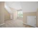 Spacious bedroom with neutral carpet, paint, and ample natural light at 210 Mediate Dr, Raleigh, NC 27603