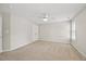 Minimalist bedroom with a ceiling fan and carpeted floors at 210 Mediate Dr, Raleigh, NC 27603