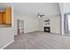 Comfortable living room with fireplace and lots of natural light at 210 Mediate Dr, Raleigh, NC 27603