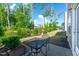 Well-maintained backyard featuring a patio, seating and manicured landscaping at 212 Brook Farm Ln, Fuquay Varina, NC 27526