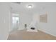 Bright bedroom featuring neutral walls, carpet flooring and a charming teepee tent in the corner at 212 Brook Farm Ln, Fuquay Varina, NC 27526