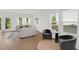 Bright and open living room with large windows at 212 Brook Farm Ln, Fuquay Varina, NC 27526