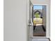 Front view of the townhome from the partially opened front door at 212 Brook Farm Ln, Fuquay Varina, NC 27526