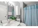 Bathroom featuring vanity, toilet, and shower with stylish blue patterned curtain at 213 Summerwalk Cir, Chapel Hill, NC 27517
