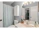 Bathroom featuring a vanity, toilet, and a shower with patterned curtain at 213 Summerwalk Cir, Chapel Hill, NC 27517